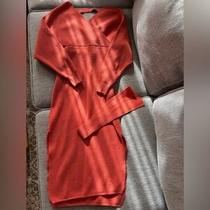 Orange tight sliming dress with slits on the sides size M